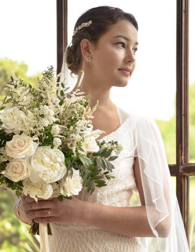 Bride at entrance of Hydro Hotel