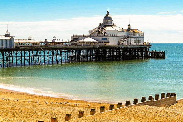 Eastbourne Pier and beach, East Sussex, England, UK