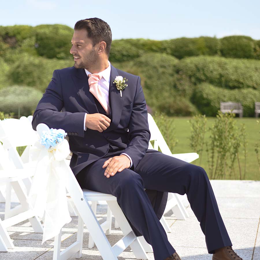 Groom seated on the terrace