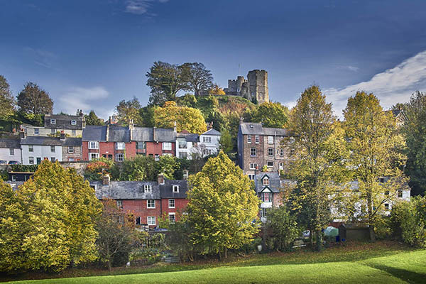 View of Lewes Castle beyond houses